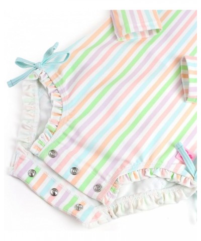 RuffleButts® Baby/Toddler Girls Long Sleeve One Piece Swimsuit with UPF 50+ Sun Protection Pale Rainbow Stripe $27.73 Swimsuits